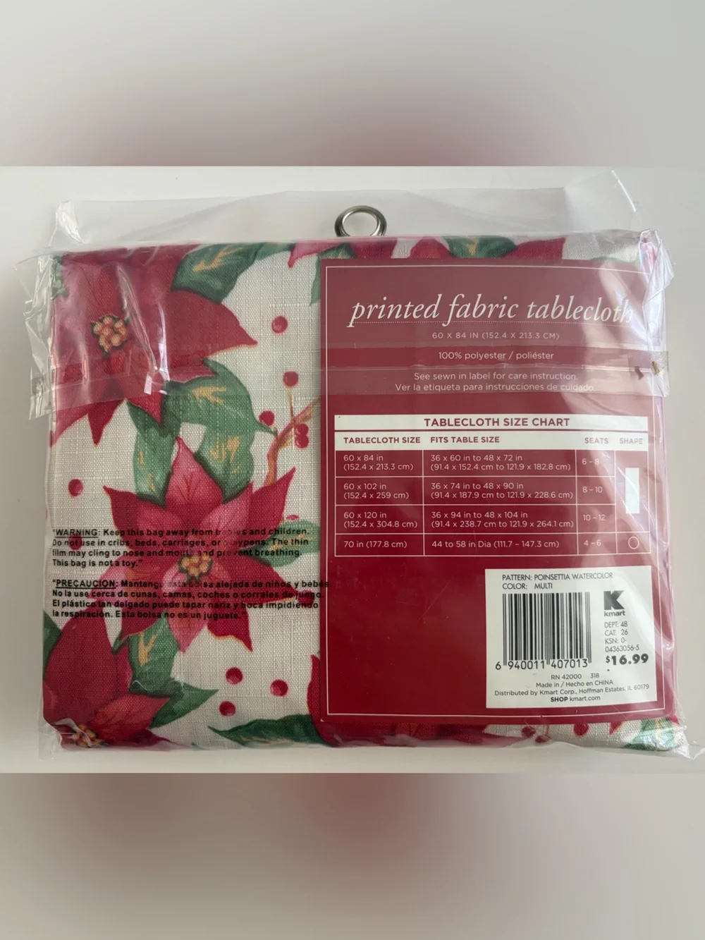 NWT Christmas print fabric tablecloth. 60x84 oblong. Original packaging